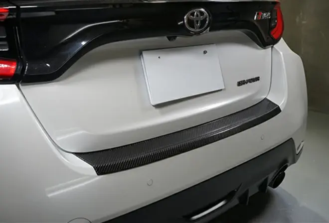 TOM'S Dry Carbon Rear bumper step guard for GR Yaris